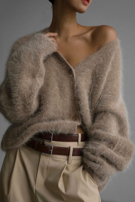 Woman wearing cozy khaki fuzzy button down cardigan