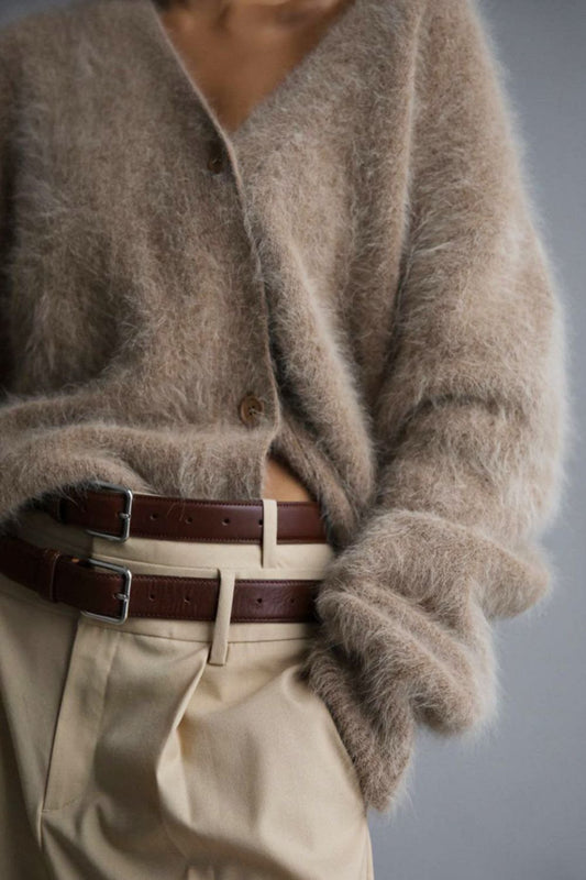 Woman wearing cozy khaki fuzzy button down cardigan
