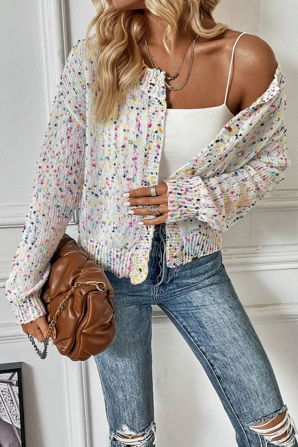 Woman wearing stylish white confetti button up long sleeve cardigan