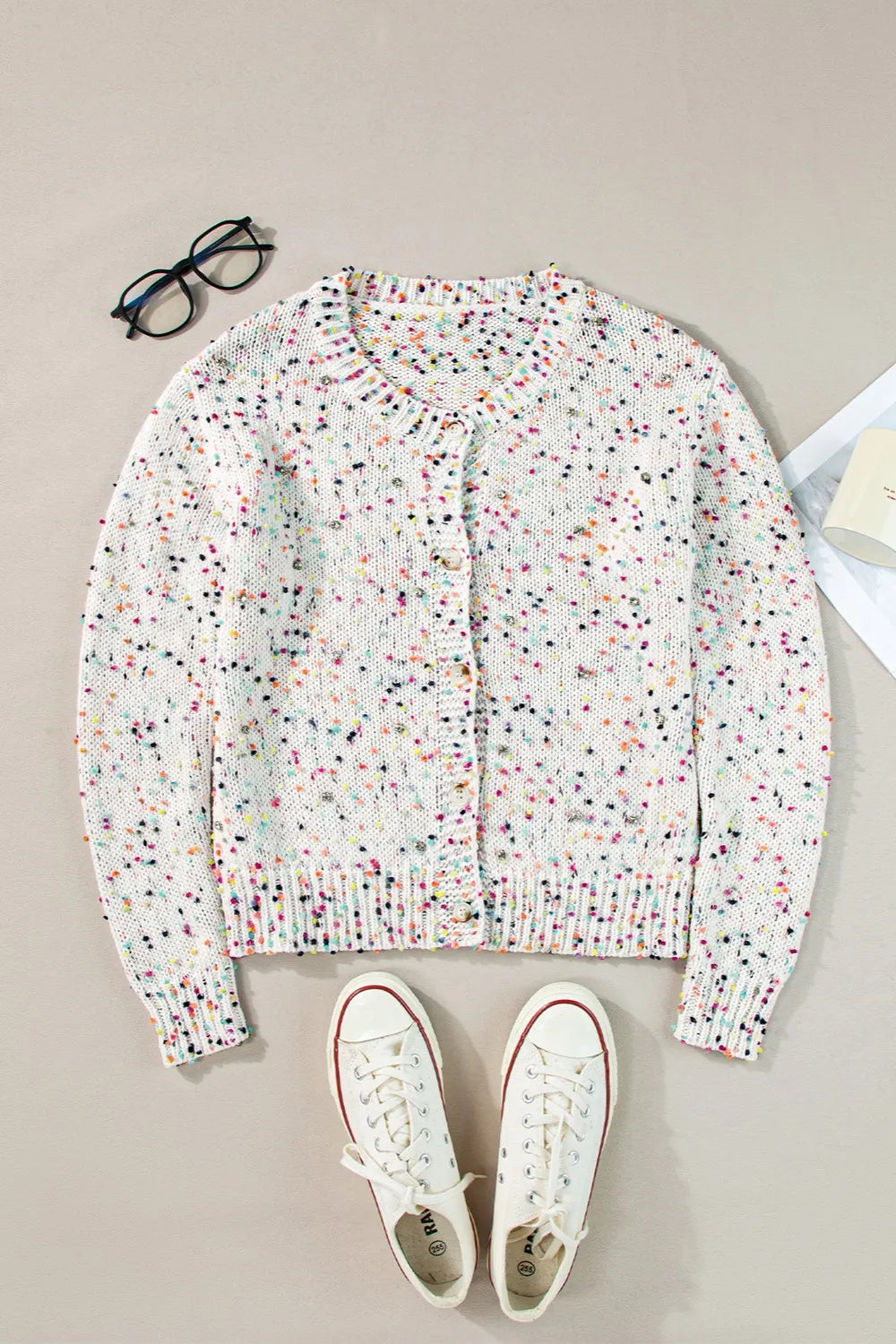 Woman wearing stylish white confetti button up long sleeve cardigan
