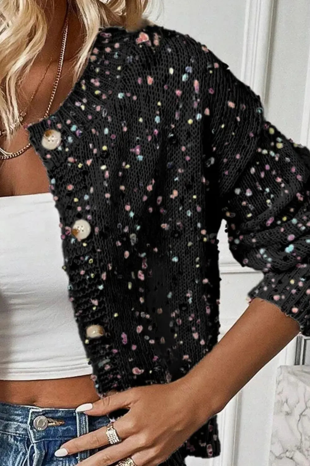 Woman wearing stylish black confetti button up long sleeve cardigan