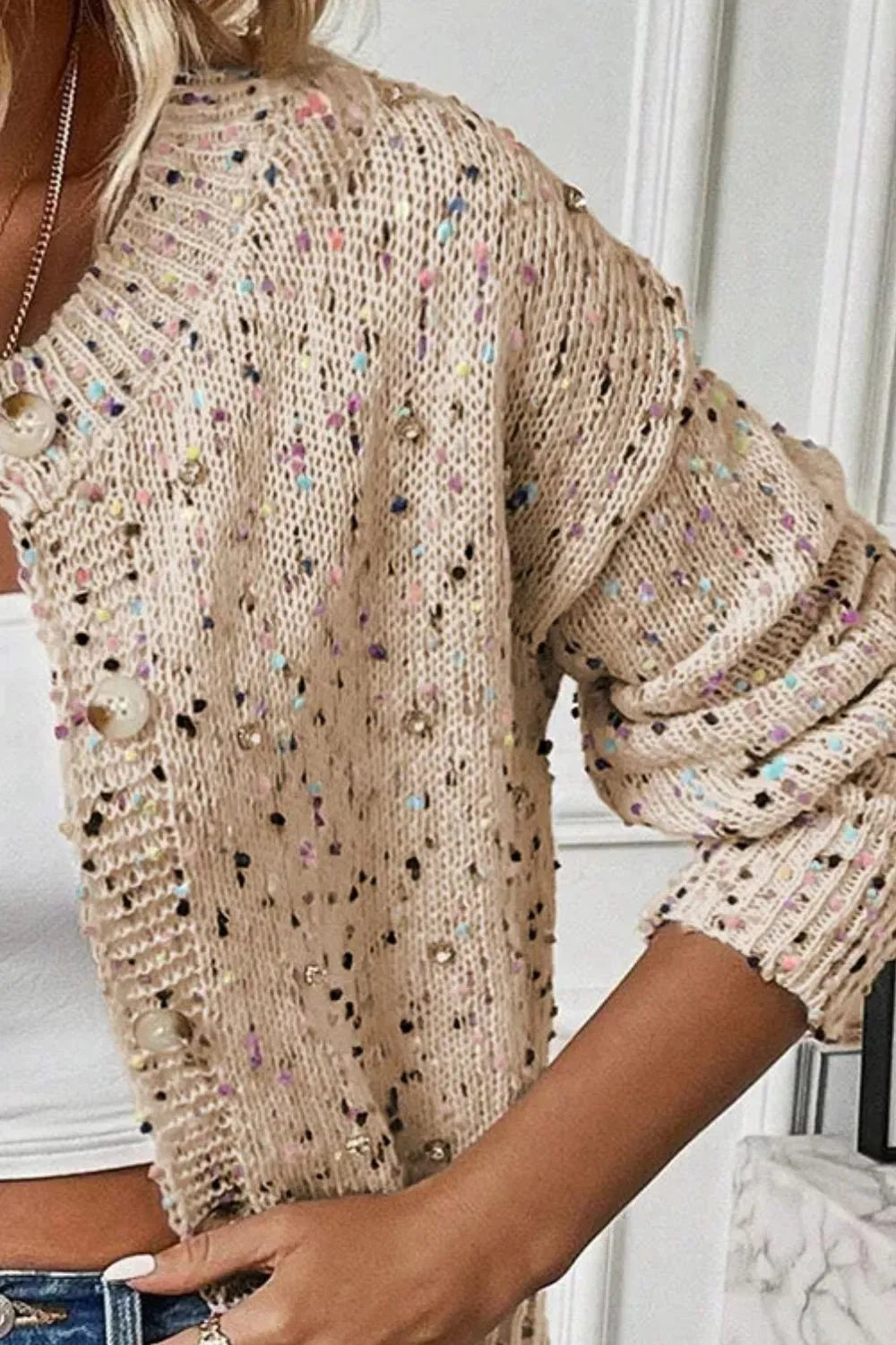 Woman wearing stylish beige confetti button up long sleeve cardigan